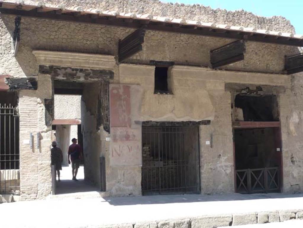 Ins. VI 13, 14 and 15, Herculaneum, August 2013. Looking south from Decumanus Maximus towards entrance doorways. Photo courtesy of Buzz Ferebee.